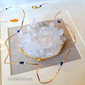 Nicole Kidd 14 karat gold necklace with ombre sapphires